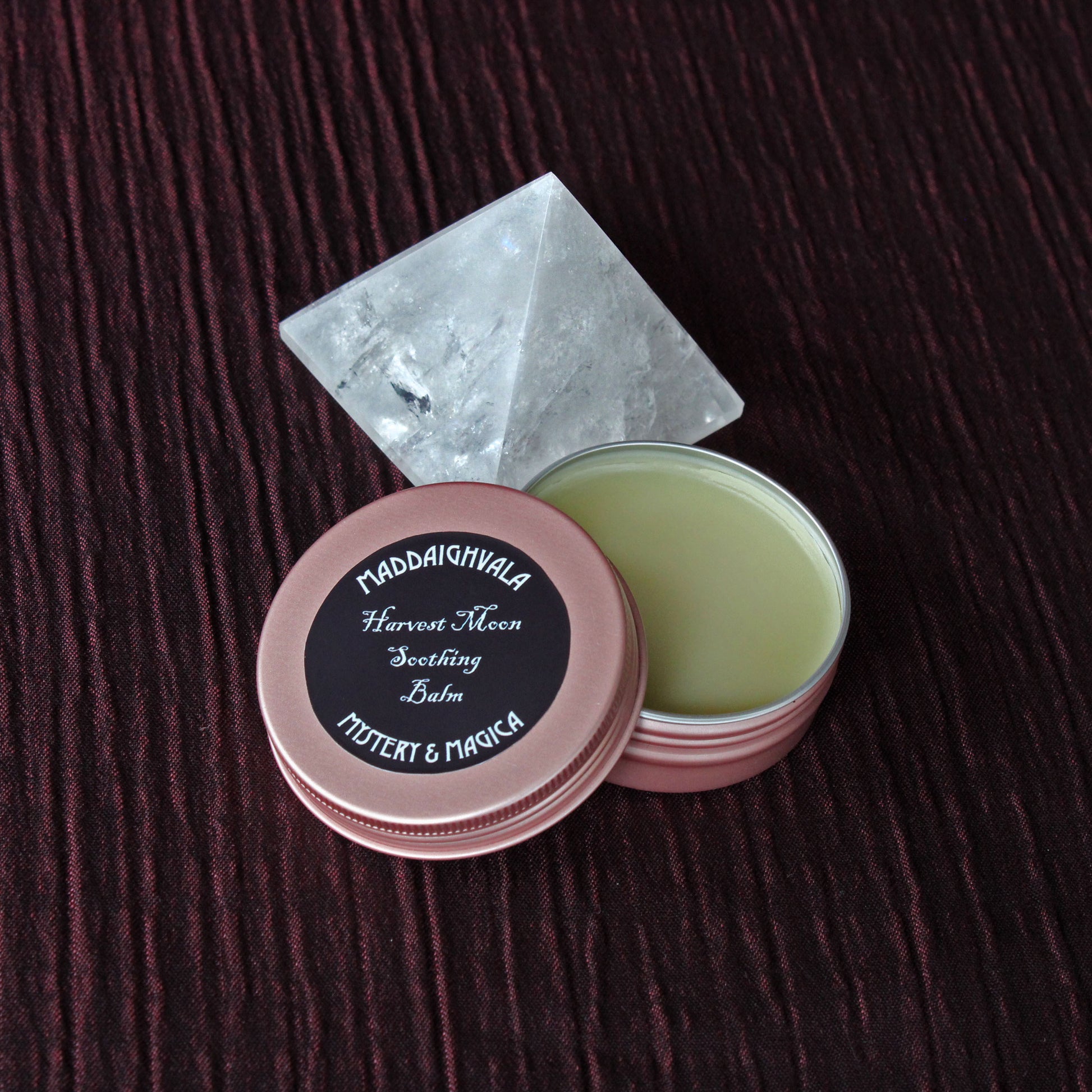 Harvest Moon Soothing Balm is infused with the healing properties of comfrey leaves, St. John's wort, chrysanthemum flowers, yarrow essential oil and benzoin resin. It is enriched with shea butter, castor oil and beeswax for a decadent silky finish.